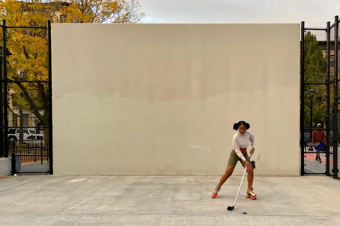 A woman on a handball court